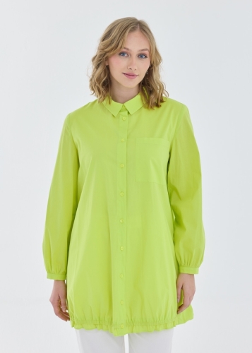 تونيك بحافة سفلية مكسّرة