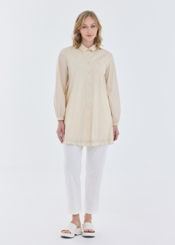 تونيك بحافة سفلية مكسّرة