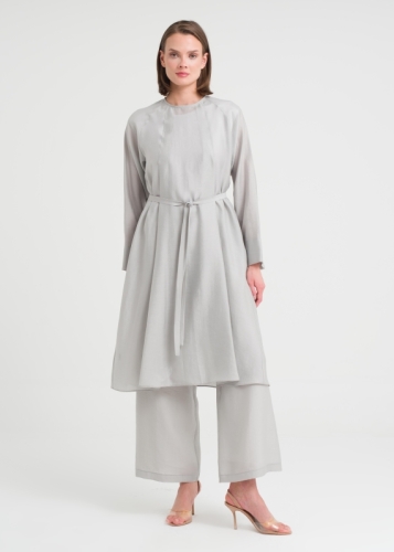 تونيك بأكمام ريغلان وتفاصيل مقطعة