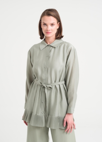 تونيك بتفاصيل كسرات في الأسفل